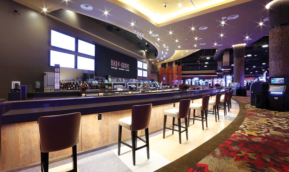 Image shows Sports Bar and barstools in front of it