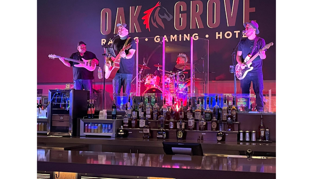 Image of band playing on Oak Grove Sports Bar's stage