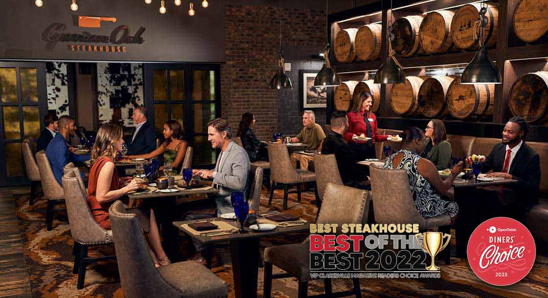 Image of Garrison Oak Steakhouse dining room with guests eating and being served. The bottom right corner has logos for "Best Steakhouse Best of the Best 2022 VIP Clarksville Magazine Readers Choice Awards" and "OpenTable Diners' Choice 2023"