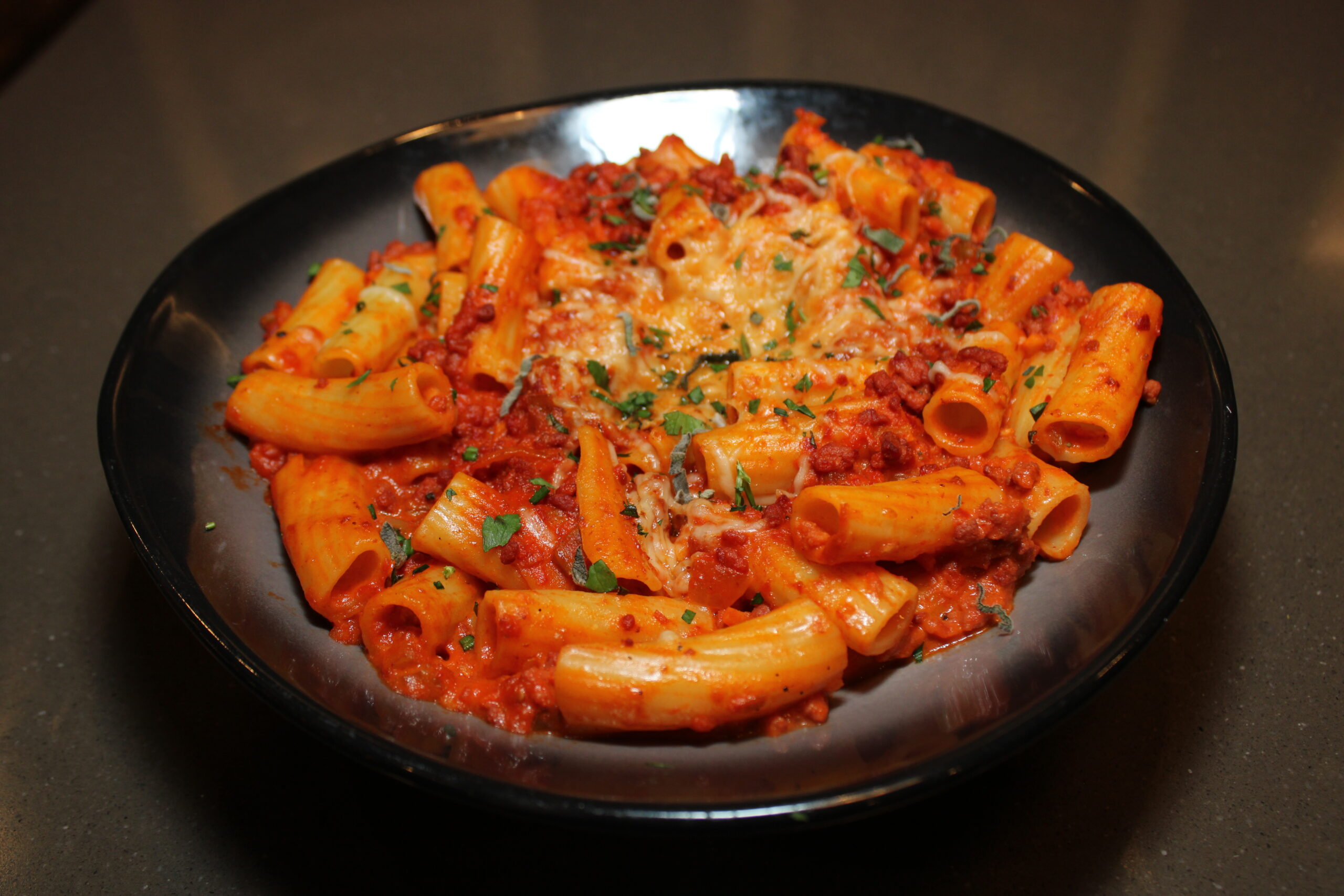 Image shows Garden Ragu dish which is a pasta with red sauce.