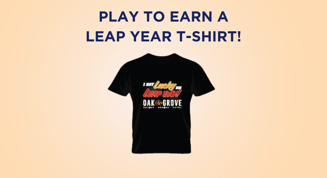 Black Shirt with the words I was lucky on Leap day at Oak Grove Gaming in gold, red and white font